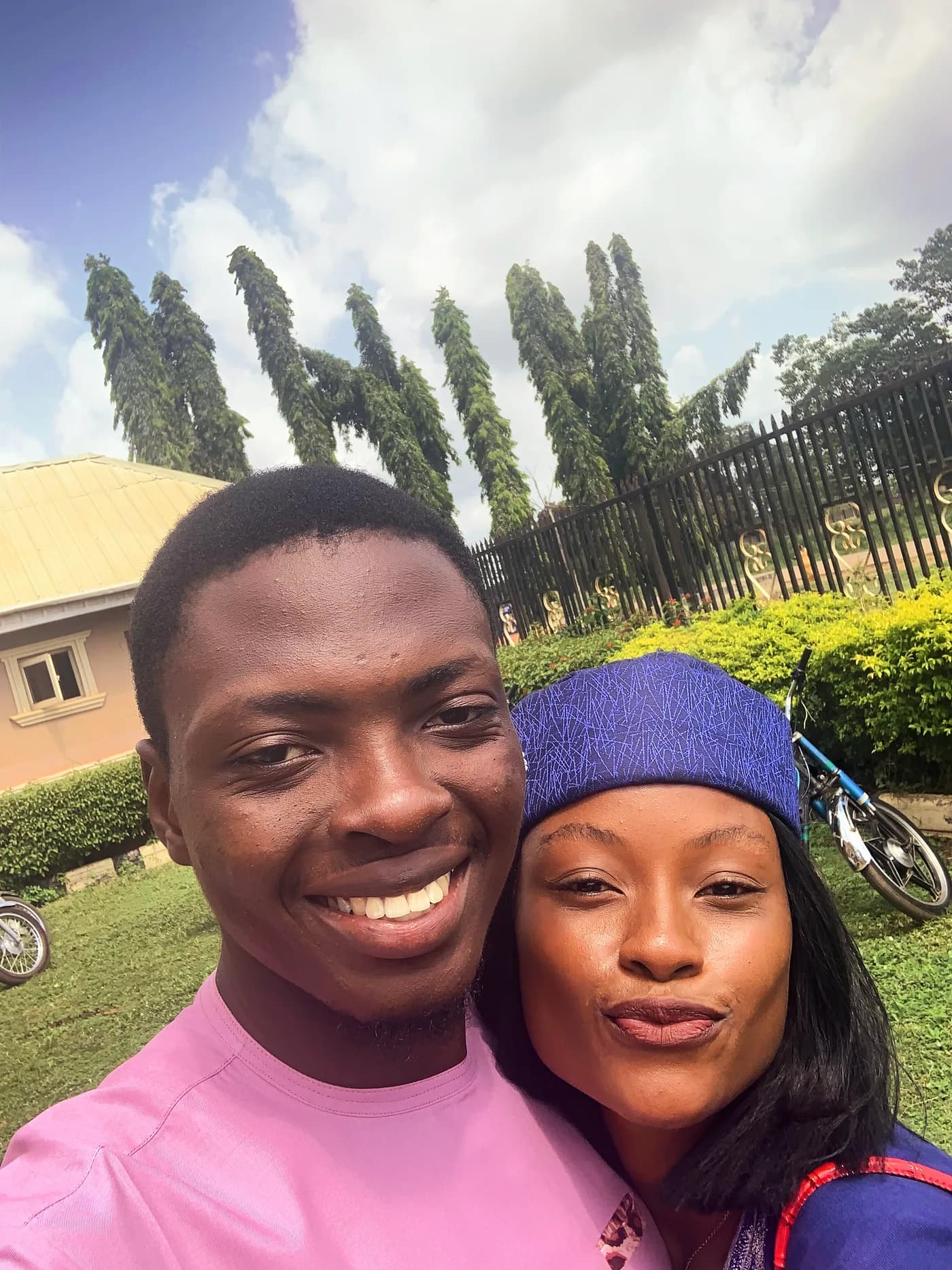 Asepe and Ajibola outdoors on a sunny afternoon